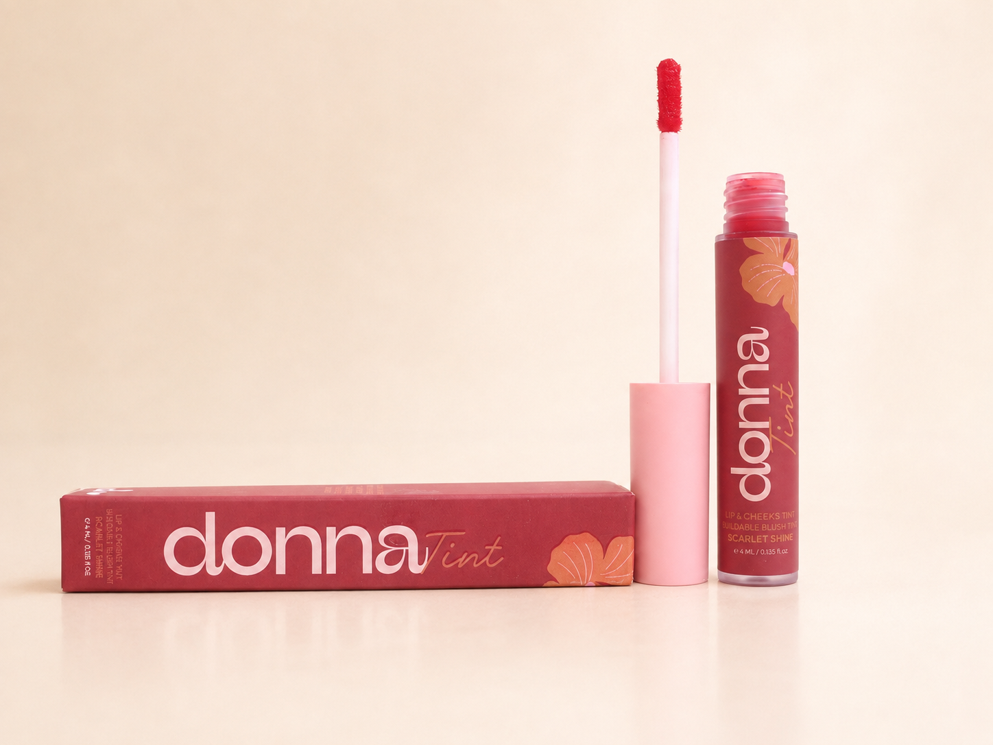 Donna Scarlet Shine Lip & Cheek Tint with its applicator and carton